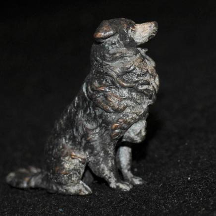 Cold Painted Sitting Dog Marked Geshutz