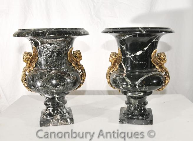 Pair French Empire Black Marble Campana Urns Cherub Handles